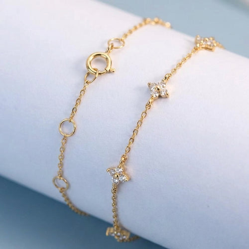 Gold flower bracelet with zircon accents