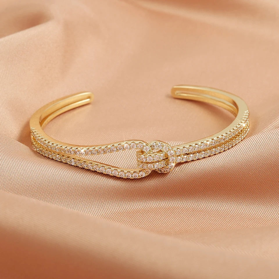 Minimalist gold knot bangle for women