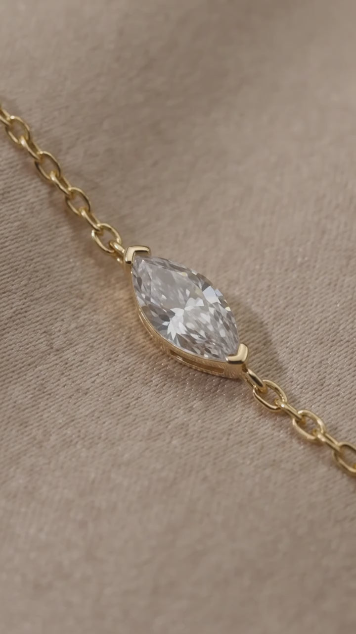 Gold oval stone bracelet with zircon